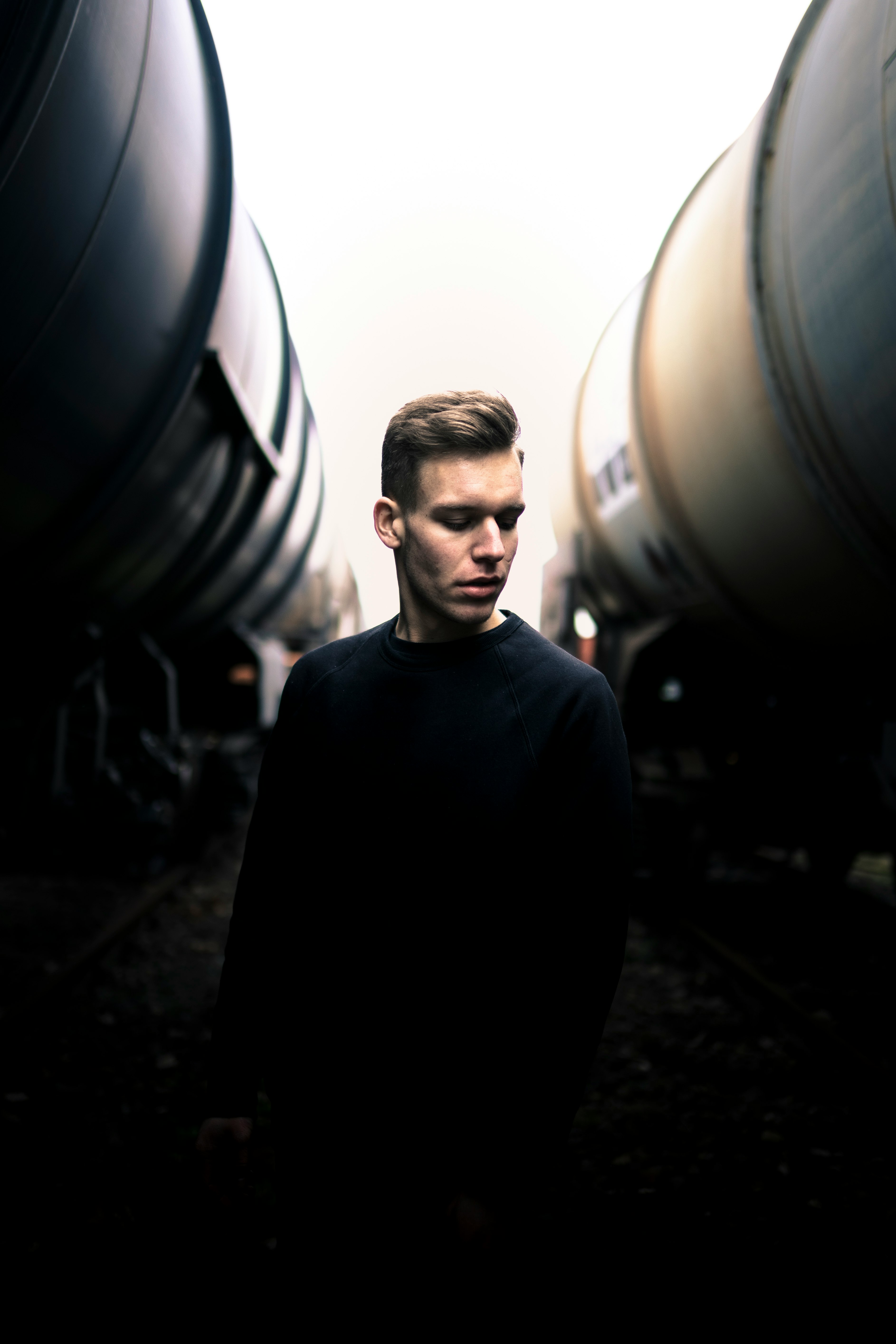 man in black long-sleeved shirt on selective focus photography